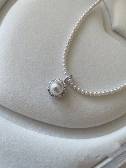 Perfectly round Australian-white seawater pearl sunflower pendant.