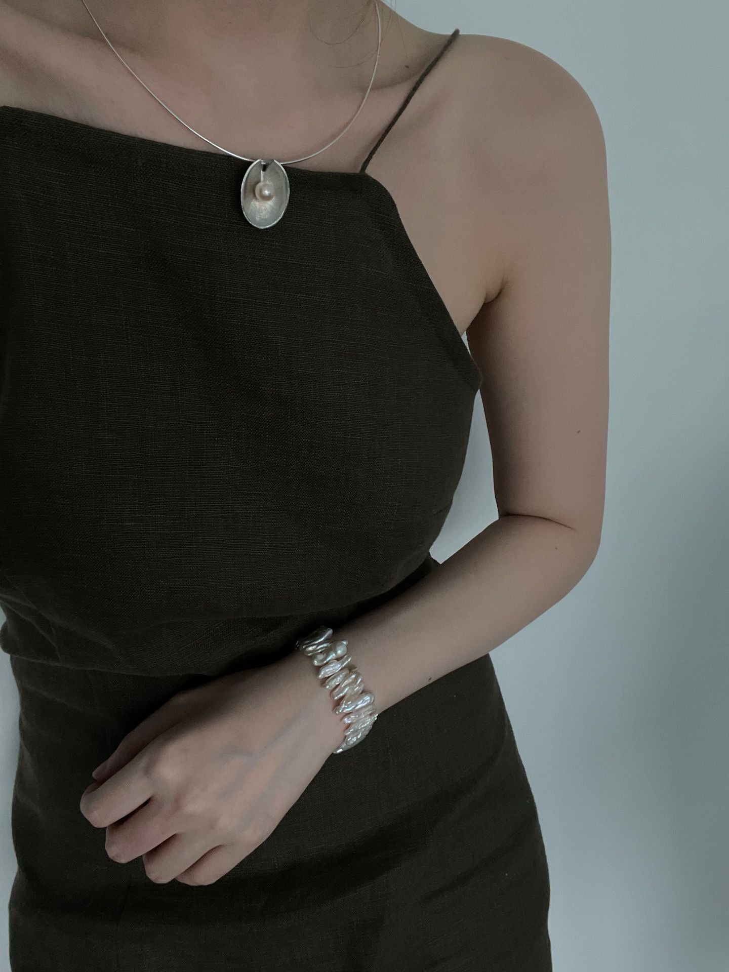 Ruffle Eye Pearl Necklace