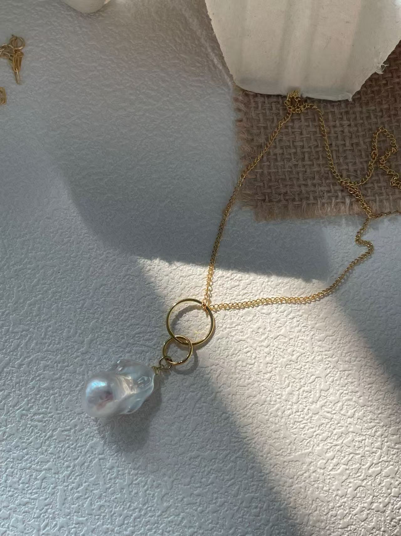 ‘Moonlight and Planetary Rings’ Warm White Baroque Pendant