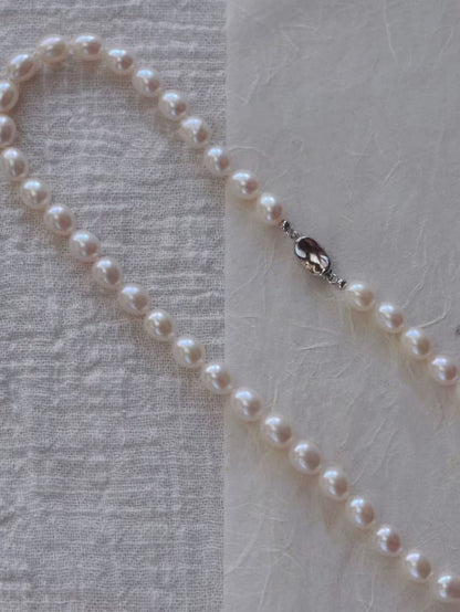 Teardrop-shaped pink lustre freshwater pearl necklace