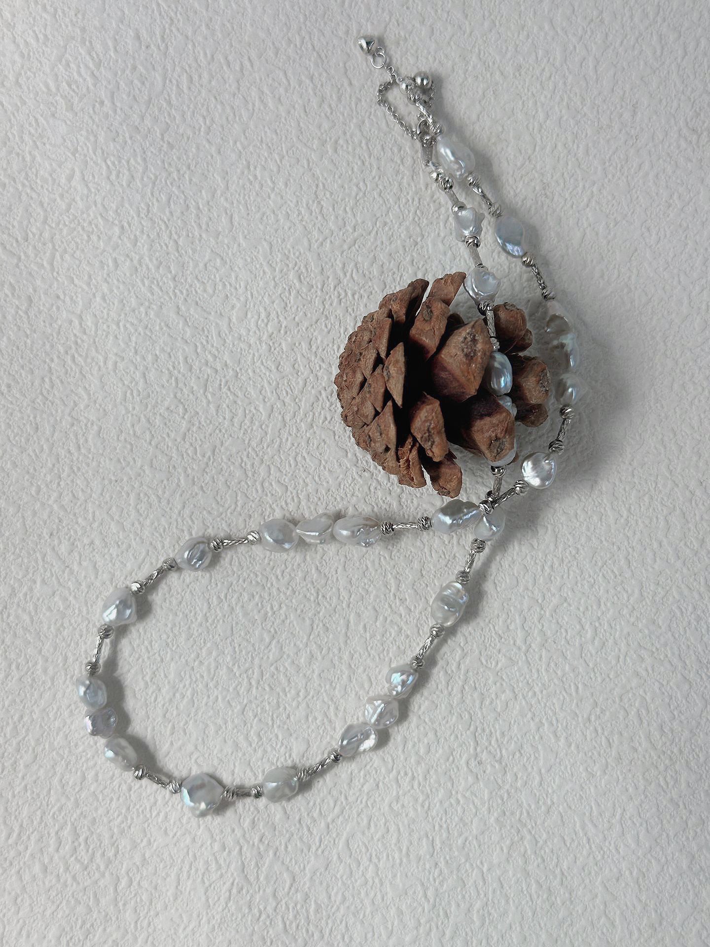 Silver and Blue Flow・Natural Keshi Pearl Silver Knot Necklace