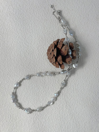 Silver and Blue Flow・Natural Keshi Pearl Silver Knot Necklace