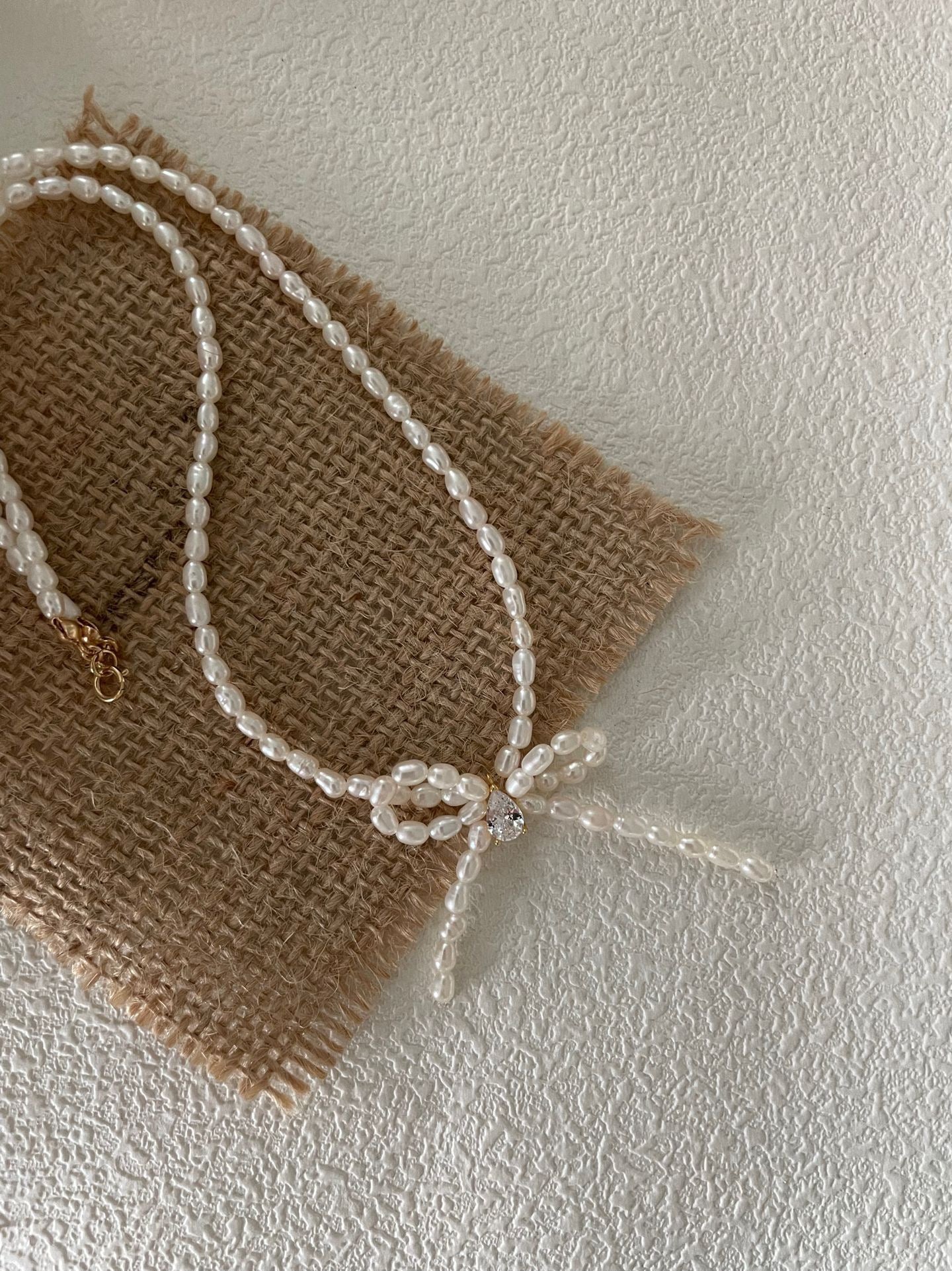 Butterfly Knot Grain Pearl Choker